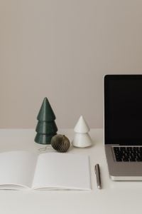 Minimal Holiday Home Office Flat Lay With Laptop, Notebook and Desk Styling