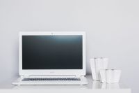 Kaboompics - White laptop with candles