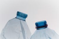 Kaboompics - Plastic Bottles Close Up Minimal White Background