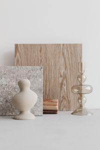 Kaboompics - White Ceramic Vase and Glass Candlestick with Gray Marble and Wood, Neutral Interior Still Life
