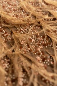 Kaboompics - Gold Beaded Fabric Macro Texture