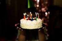 Kaboompics - Colorful Birthday Candles on Cake with Nostalgic Bokeh