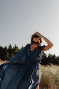 Kaboompics - Woman in Blue Kaftan and Sunglasses in Coastal Dunes