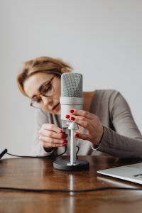 Kaboompics - Woman in Glasses Recording ASMR with a Studio Microphone at Home