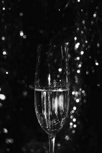 Kaboompics - Black And White Champagne Flute With Party Lights