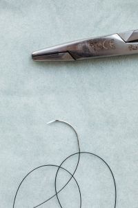 Kaboompics - Macro of Surgical Needle and Dental Needle Holder