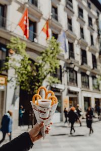 Kaboompics - Churros with a cup of hot chocolate