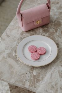 Kaboompics - Pink Pointed Shoes with Round Embellishments on Marble