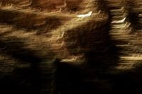 Kaboompics - Horizontal Golden Light Trails with Deep Black Copy Space, Abstract Background for Design