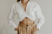 Kaboompics - Minimal Fashion Woman in White Shirt and Beige Trousers Close-Up