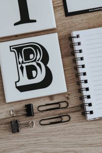 Inspirational cards with quotes and an empty notebook