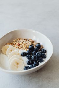 Kaboompics - Breakfast Bowl with Banana, Granola and Blueberries