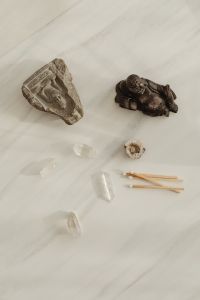 Kaboompics - Minimal Buddha Display On Stone Table