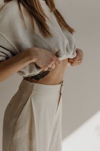 Kaboompics - Neutral Fashion Lifestyle with Woman and Black Cat