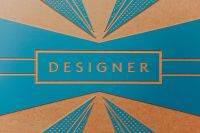Kaboompics - Designer Nameplate on Blue and Tan Workflow Infographic, Graphic Design Background