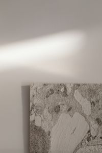 Kaboompics - Rough Stone Slab Beside White Wall