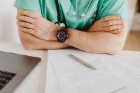 Kaboompics - Medical Professional Seated Behind Office Desk