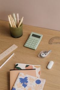 Kaboompics - Mint Calculator and Beige Desk Supplies
