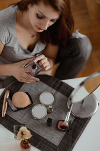 Kaboompics - Young beautiful woman doing her make up