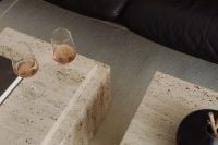 Kaboompics - Wine Glasses on Travertine Coffee Tables beside Black Sofa