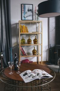 Stylish home decor with a wooden round table and a bookcase