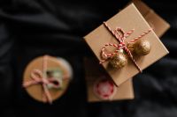 Kaboompics - Overhead Christmas Gifts Beside a Joy Pillow