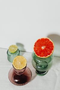 Kaboompics - Grapefruit, Lemon and Lime in Colored Glass for Editorial Styling