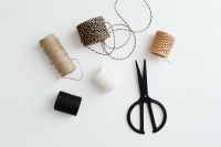 Kaboompics - Colorful Twine Collection And Black Scissors On Minimal Background