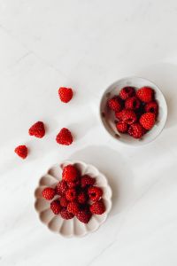 Kaboompics - Colander And Flower Dish With Fresh Raspberries