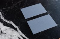 Kaboompics - Two Blue Business Cards on Black Marble, Minimal Branding Mockup