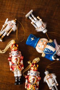 Kaboompics - Colorful Nutcracker Ornaments on Brown Wood