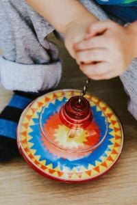 Kaboompics - Child playing with toys on the floor