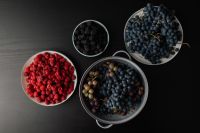 Kaboompics - Overhead Fruit Bowls on a Dark Background