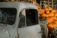 Kaboompics - Vintage Truck Beside a Pumpkin Display
