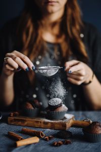 Kaboompics - Woman Sifting Powdered Sugar