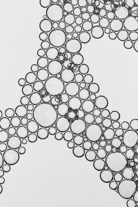 Kaboompics - Black and White Bubble Stream with Diagonal Organic Flow, High-Contrast Abstract Texture Background with Copy Space