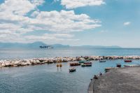 Kaboompics - Rock Breakwater and Fishing Boats Along the Tyrrhenian Sea