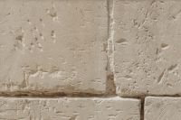 Kaboompics - Weathered Pale Stone Wall with Horizontal Layers