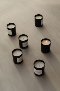 Kaboompics - Black Candle Assortment on a Raw Stone Surface