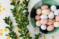 Kaboompics - Close-Up of Pastel Speckled Eggs in a Ceramic Bowl