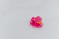 Kaboompics - Pink rubber ducky in foam