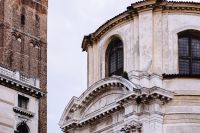 Kaboompics - Ornate White Stone Facade with Arched Windows in Venice