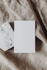 Kaboompics - Overhead Business Card Mockup on Linen beside a Marble Slab