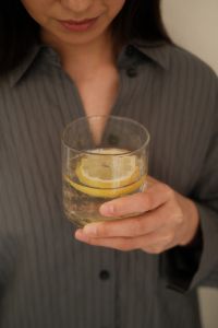 Kaboompics - Woman Holding a Morning Drink by the Window