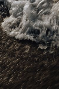 Kaboompics - Golden Brown Water Streaks in Fast Motion, Abstract Background