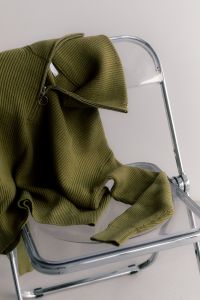 Kaboompics - Olive Green Quarter Zip Knitwear on Transparent Chair