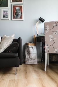 Kaboompics - Eclectic Home Office Interior With Floral Chair And Paper Bag