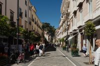 Kaboompics - Busy Sorrento Town Street With Shops, Balconies And Cyclists