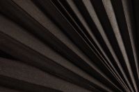 Kaboompics - Macro Dried Palm Frond Ridges Converging Across a Dark Brown Texture
