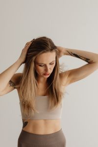 Kaboompics - Close-Up of Woman Adjusting Her Hair With Both Hands